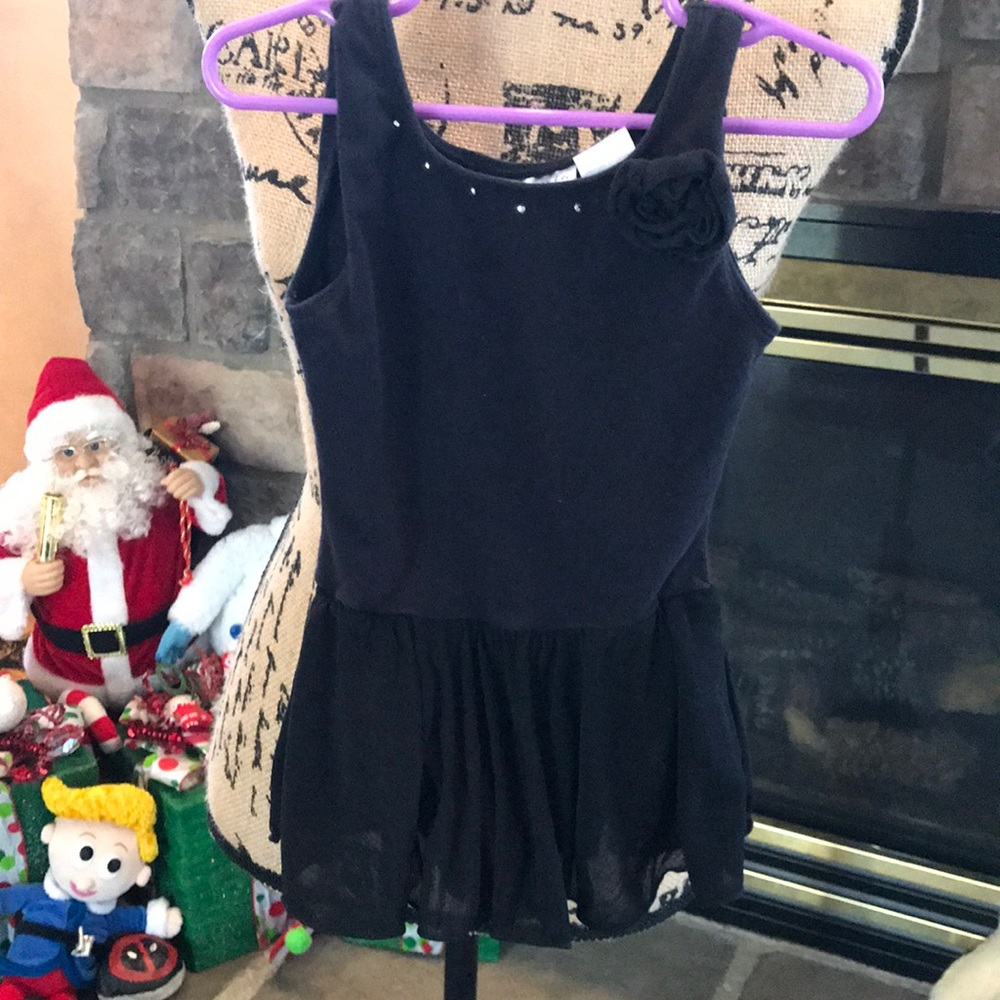 black leotard with attached skirt